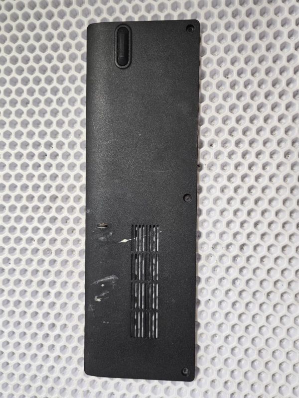 Заглушка опепративной памяти от поддона 13N0-G5A0701 для Asus N71J